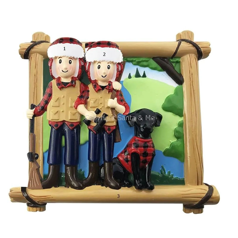 hunting couple with black dog ornament